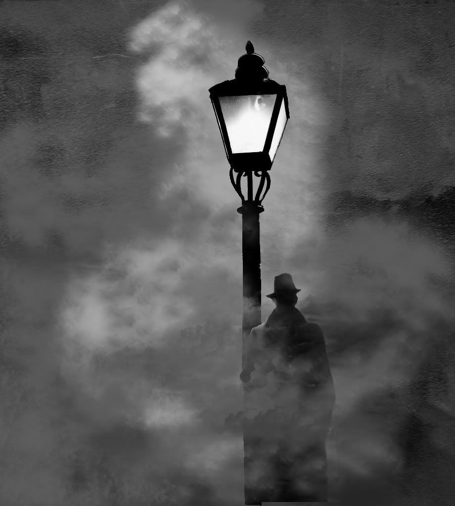A figure in a long coat and hat waits beneath a street lamp in heavy fog.